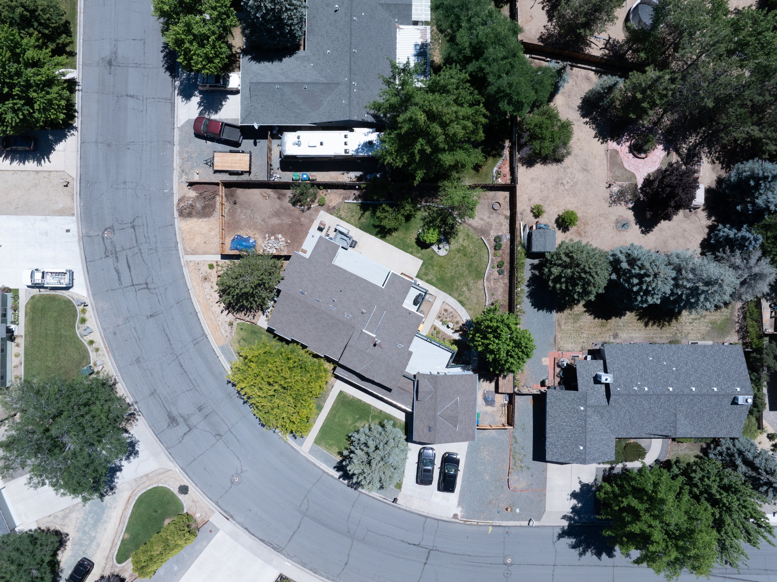 Overhead aerial showing a residential parcel, roofline, and surrounding lots, Carson City, Nevada
