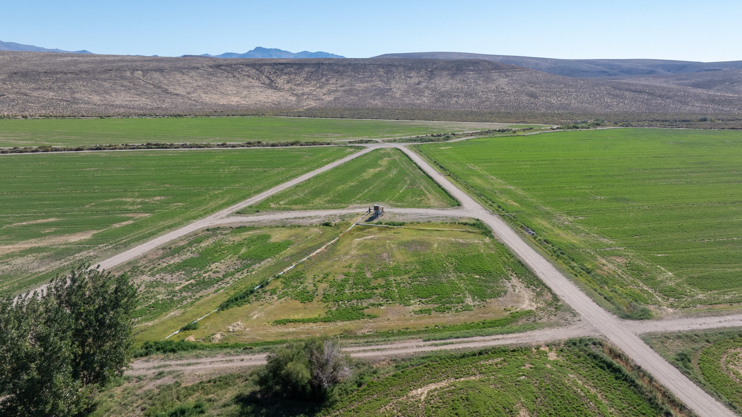 Aerial showing irrigation infrastructure and access roads across farmland, northern Washoe County, Nevada